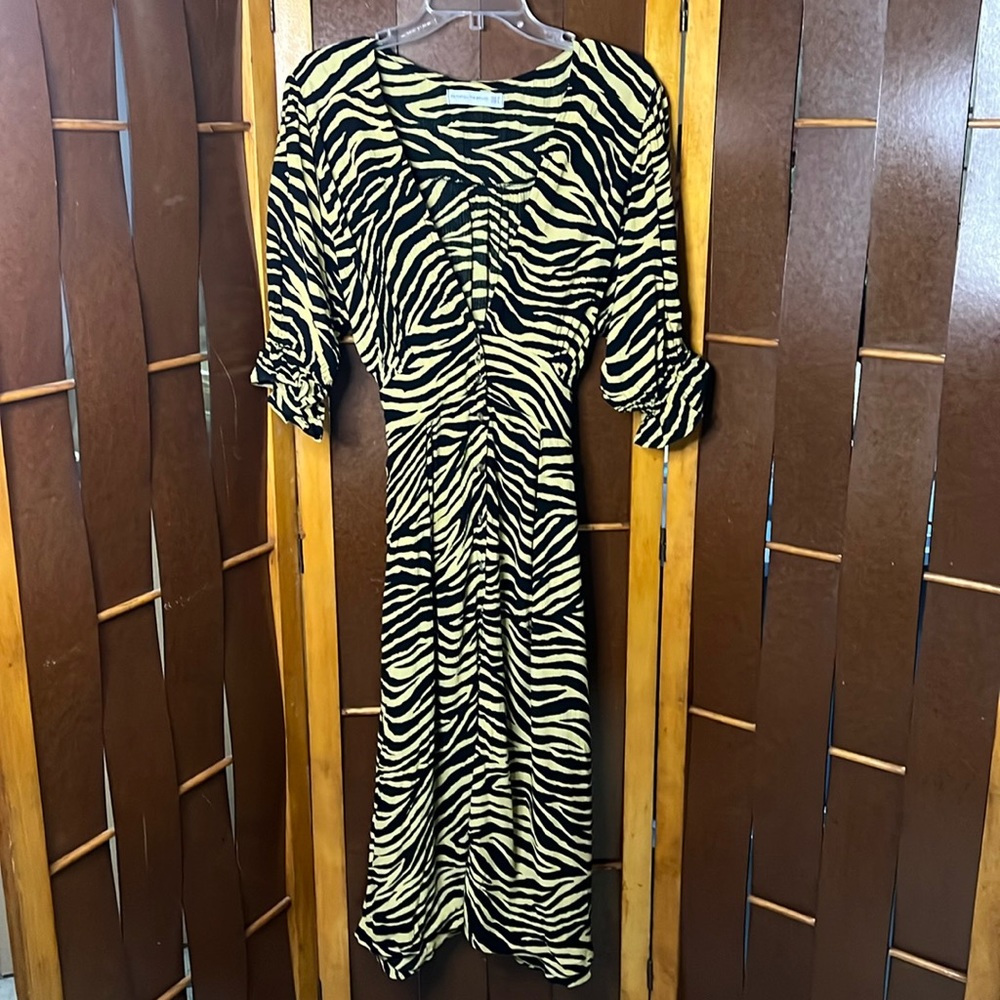 Faithful the Brand tiger print midi dress.